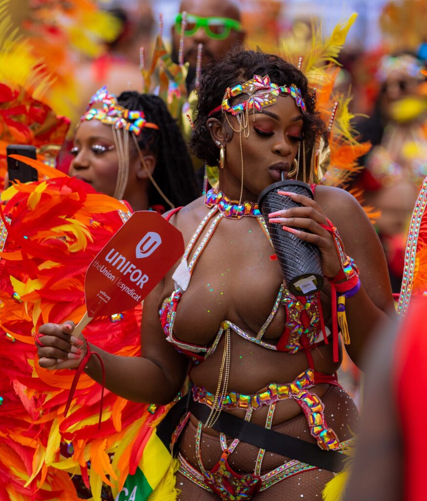 Why Playing Mas at Toronto Carnival is a Must-Try - Toronto Carnival Costumes - Sunlime Mas. Masquerader at Toronto Carnival with Sunlime Mas.